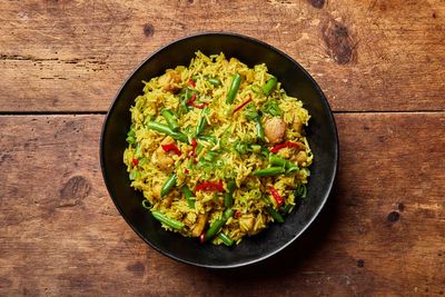 Leftover rice gets a new life in this Nigerian-inspired curried skillet meal