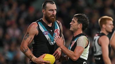 Butters cleared at AFL Tribunal, Dixon to fight charge