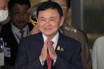 Former Thai PM Thaksin indicted on charge of royal defamation as court cases stir political woes
