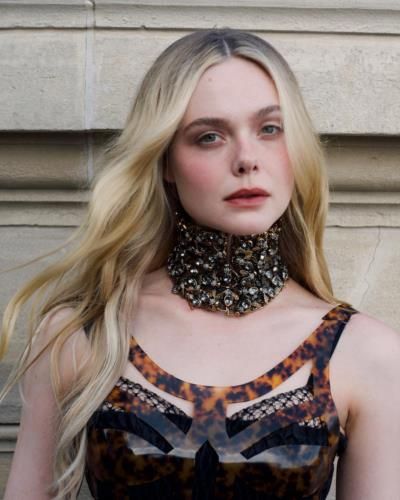 Elle Fanning Stuns In Bold Brown Outfit Photoshoot On Instagram