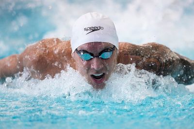 Tokyo Olympic star Caeleb Dressel makes his debut at US swim trials, advancing in the 100 free