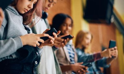 ‘Let kids be kids’: LA becomes largest US school district to ban phones in class