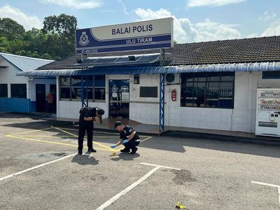 5 family members of Malaysian man who attacked police station face terrorism charges