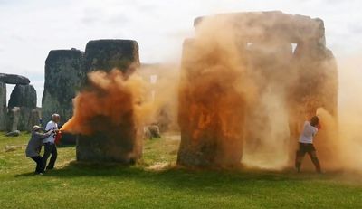UK Police Arrest Pair After Stonehenge Sprayed With Orange Substance