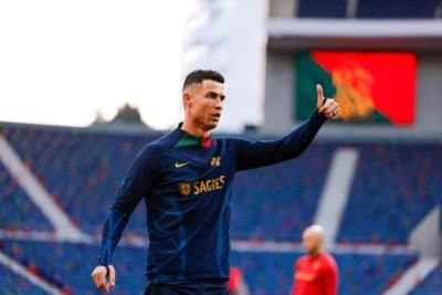 Cristiano Ronaldo Leading His Team In Dark Blue Jersey