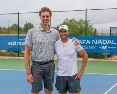 Athletic Camaraderie: Rafael Nadal And Pau Gasol In White