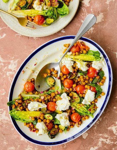 Honey & Co’s recipe for salad of air fryer crisp chickpeas, courgettes and tomatoes