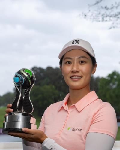 Lin Xiyu Celebrates Victory With Golf Trophy In Hand