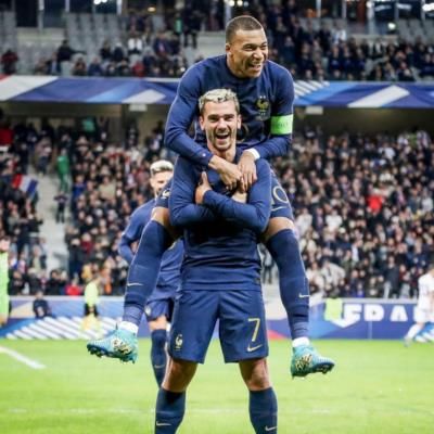 Team Unity And Success: Antoine Griezmann Celebrates Victory