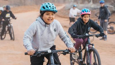 Cycling gains momentum among largest Native American tribe but bikes are scarce — here's how you can help