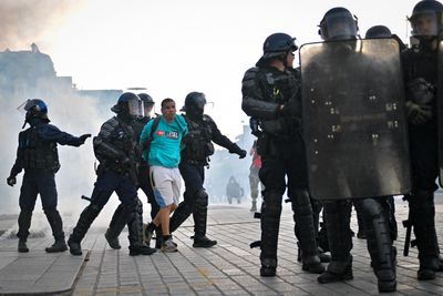 French rally against far right ends in clashes ahead of national elections