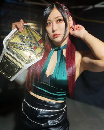 Iyo Sky: Strong And Confident WWE Champion In Green And Black