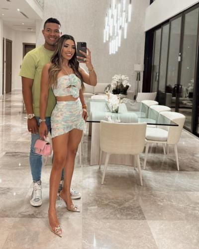 José Quintana And Partner Radiate Joy In Stylish Mirror Selfie