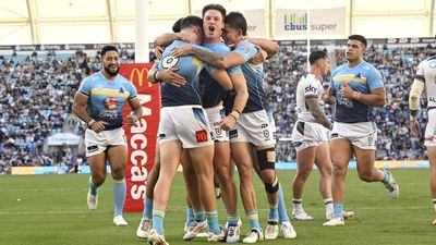 Titans massacre woeful Warriors in landmark win