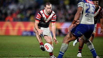 Walker fires Roosters into top four with win over Dogs