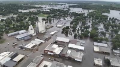 Iowa Governor Sends Helicopters For Flood Evacuation, Heatwave Persists