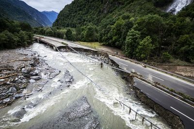 Switzerland floods: One dead and search continues for others as resort left completely cut off