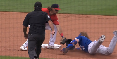 MLB fans were confused after Justin Turner was ruled safe because his helmet blocked the Guardians’ tag