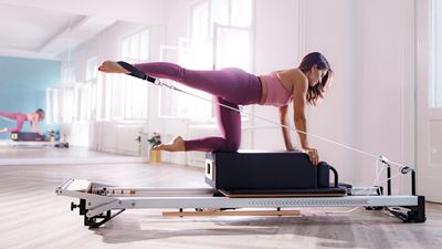 I ditched weight training for a Reformer Pilates class — here's what happened