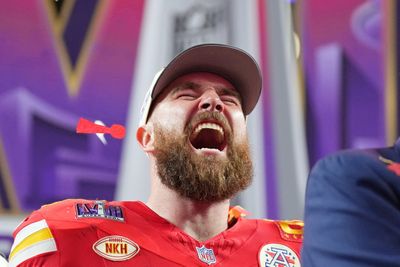 Travis Kelce clicking his heels in a tux on stage with Taylor Swift became an instant meme