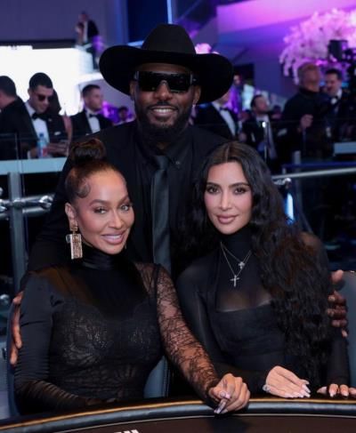 Dez Bryant Poses With La La Anthony And Kim Kardashian