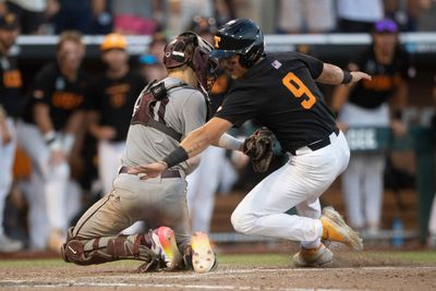 Tennessee’s Hunter Ensley juked the Texas A&M catcher to score a huge run in College World Series Final Game 3