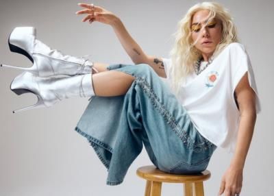 Lady Gaga's Stylish Pose: A Captivating Blend Of Fashion