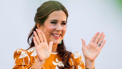 Queen Mary of Denmark goes bold in all-over orange and some of the prettiest statement earrings we've seen this year