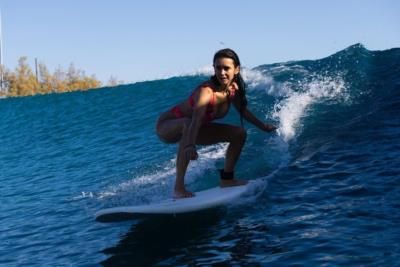 Nina Dobrev Stuns In Vibrant Pink While Surfing On Instagram