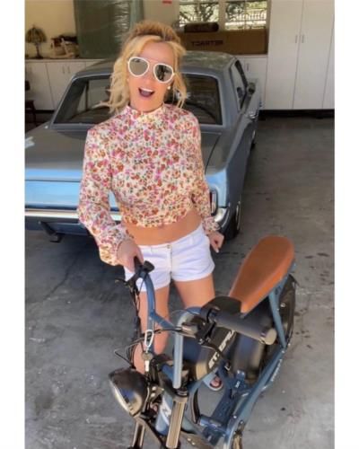 Britney Spears Showcasing Edgy Style With A Sleek Motorbike