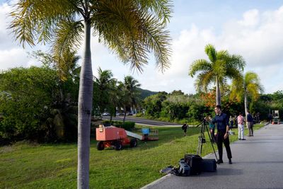 Saipan, placid island setting for Assange's last battle, is briefly mobbed — and bemused by the fuss