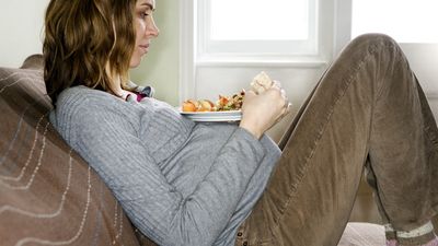 How many extra calories does a person need during pregnancy?