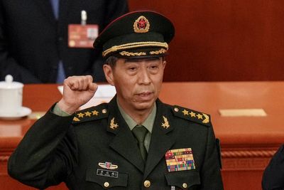 Former Chinese defense minister expelled from ruling Communist Party over graft allegations