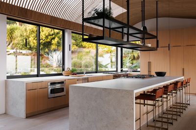 Can I Have a Kitchen Window Flush With the Countertop? We Investigate This "Inviting" Design Choice