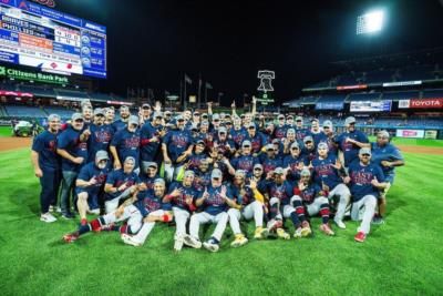 Max Fried And Teammates Celebrating Victory On The Baseball Field