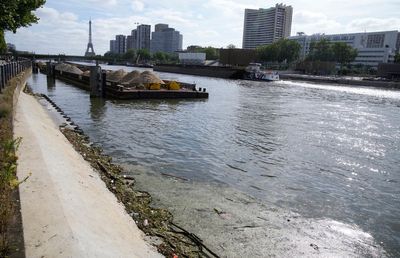 Tests show Paris' Seine River still has unsafe E. coli levels with Olympics less than a month away