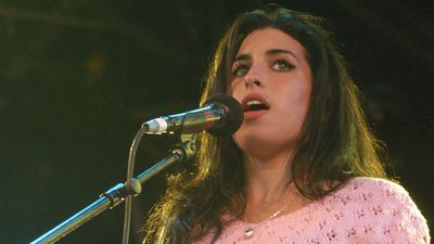 Away from the crowds, rare backstage footage shows Amy Winehouse covering a classic Beatles song at Glastonbury 2004