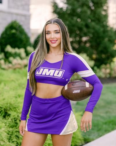 Kendall Vertes Showcasing Athletic Prowess In Vibrant Purple Sports Attire