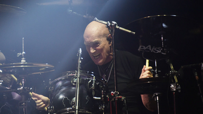 Chris Slade admits to feeling insulted when AC/DC asked him to stick around as Phil Rudd's understudy
