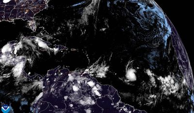 Tropical Storm Beryl forms in the Atlantic Ocean, blowing toward the Caribbean Sea