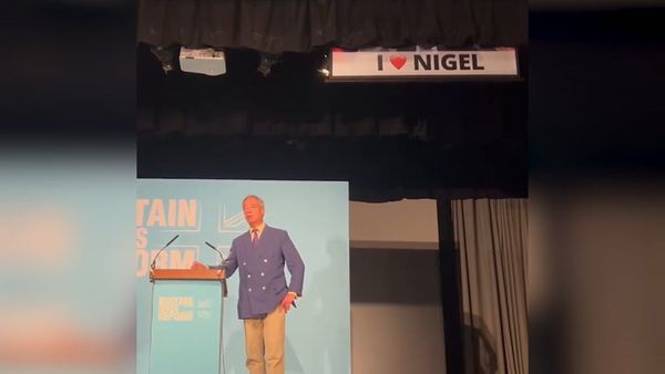 Nigel Farage speech interrupted as Led by Donkeys protesters lower in Vladimir Putin banner