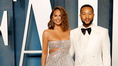 Chrissy Teigen and John Legend strategically create a 'dining room' feel in their kitchen with this on-trend seating arrangement