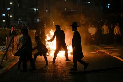 Ultra-Orthodox protest against order to enlist in Israeli military turns violent in Jerusalem