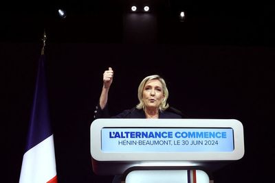 Marine Le Pen’s far-right National Rally party take the lead in first round of French election voting