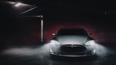 Dow Jones Futures Fall: Tesla Stock Surges Ahead Of Q2 Deliveries; Powell Speech Next