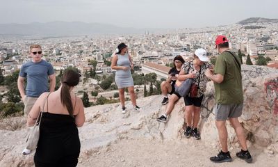 ‘My escape is going north’: heatwaves begin to drive tourists in Europe to cool climes