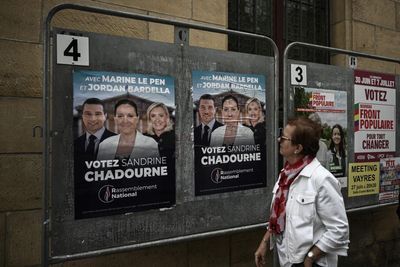 More than 210 candidates quit French runoff, aiming to block far right