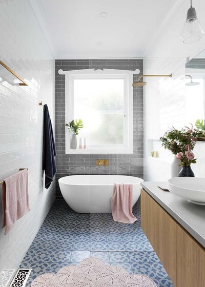 This small family bathroom design packs a pretty punch