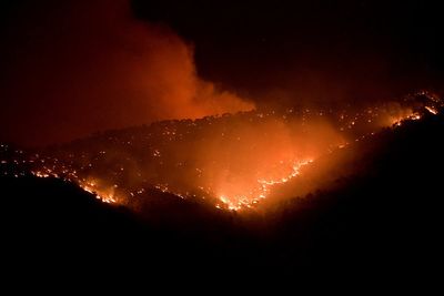 Freak weather hits Greece as lightning strikes trigger wildfires on tourist island