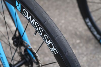 A quest for marginal gains: DT Swiss, Continental and Swiss Ride collaborate on a front-specific aero tyre, currently being raced at the Tour de France